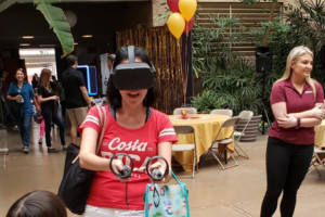 A woman having fun with VR goggles on