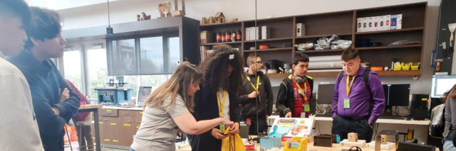 Jodie Donner helps a student at the IgnitED Lab west