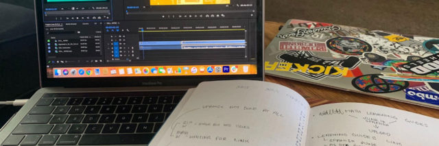 a notebad and laptop
