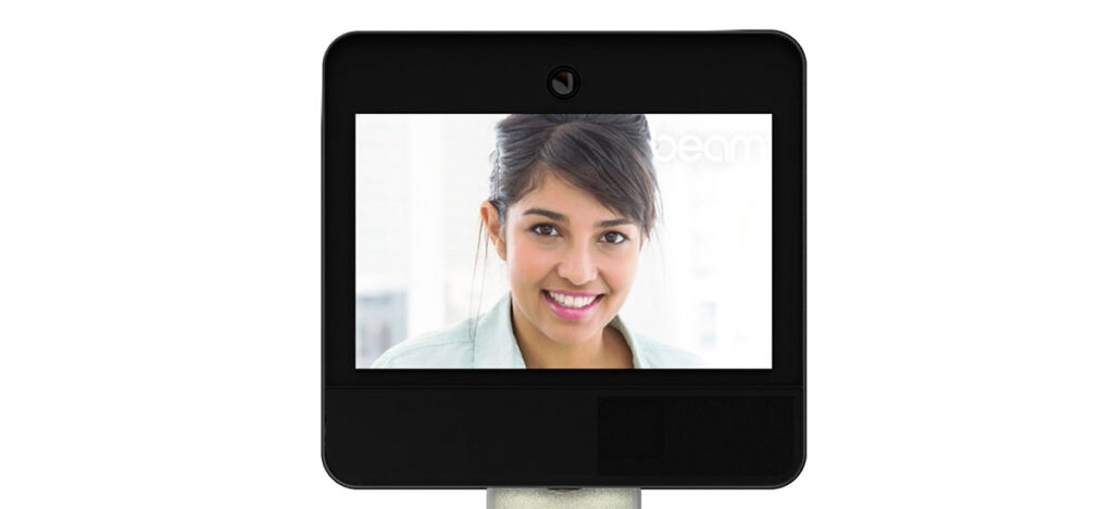 A smiling face on the Beam Telepresence robot's display screen